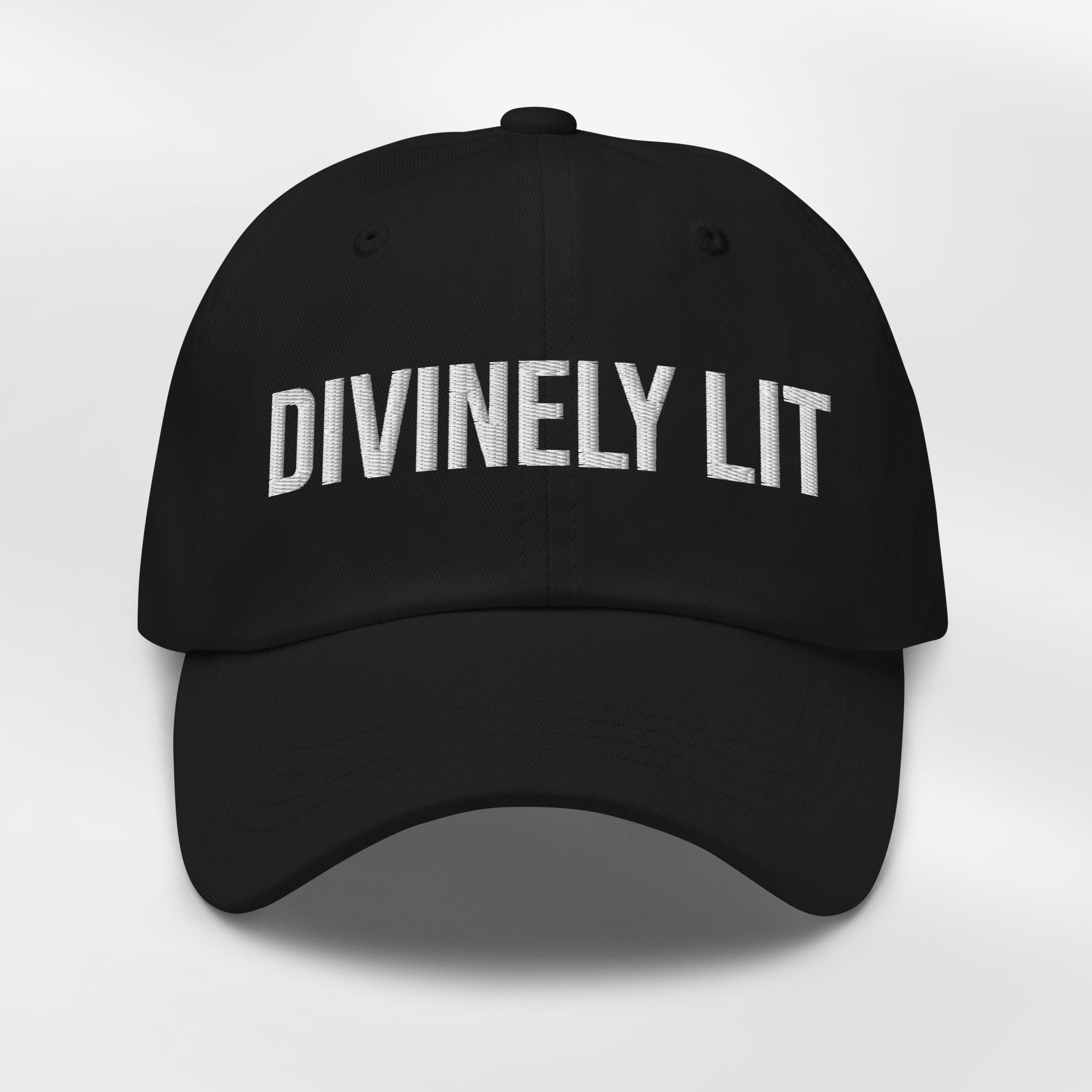 Black cap with embroidered 'DIVINELY LIT' text on a white background