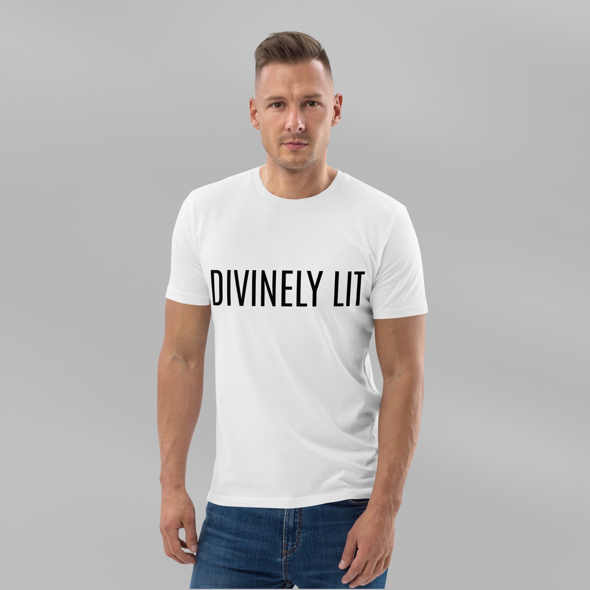 Man wearing a white t-shirt with 'DIVINELY LIT' text on a gray background