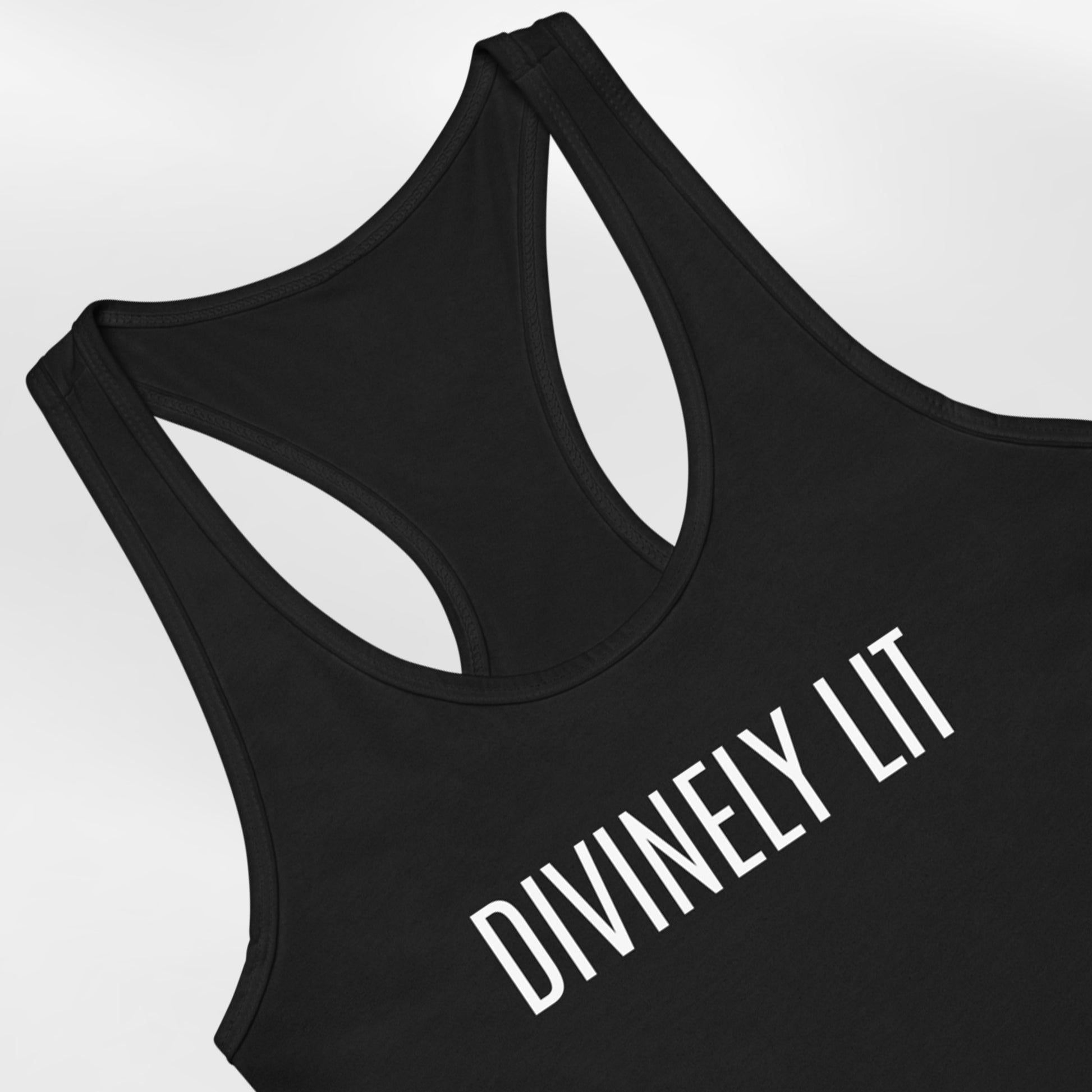 Black Women's Fitted raceback tank top with 'DIVINELY LIT' text on a white background