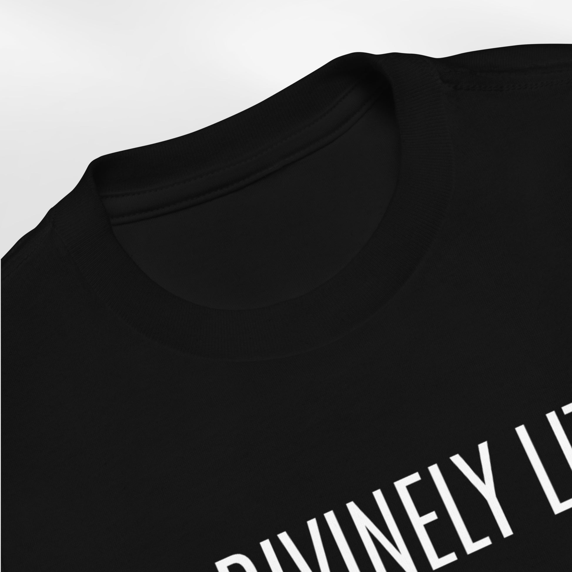 Black Toddler T-shirt with 'DIVINELY LIT' text on a white background